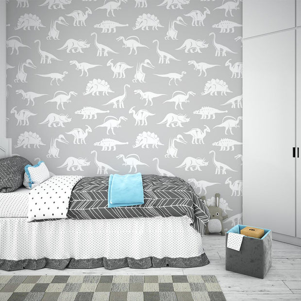 Minimalistic grey dinosaur wall mural with white dinosaur silhouettes, perfect for a modern kid's bedroom or nursery.