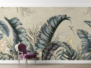 Tropical elegance wall mural featuring oversized banana leaves, bird of paradise flowers, and a hummingbird in muted tones for a luxurious interior.