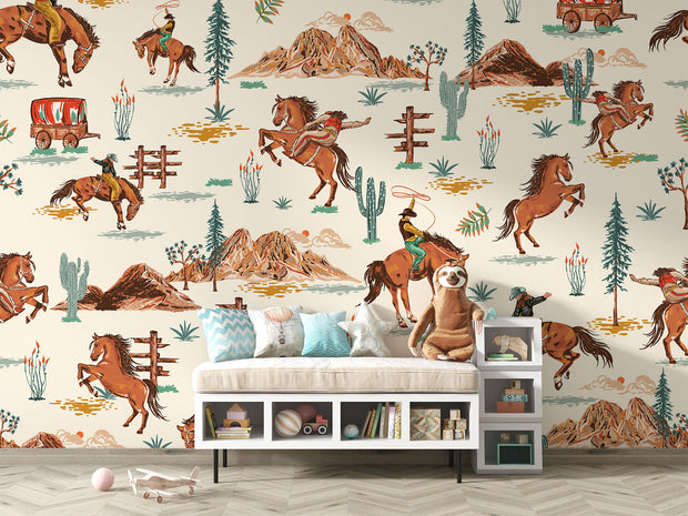 Wild West cowboy wall mural featuring galloping horses, cowboys, cacti, and Western landscapes in a vintage-style wallpaper design.