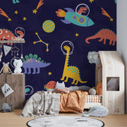 Space Dinosaurs Wall Mural featuring colorful astronaut dinosaurs, planets and stars; decorating kid's bedroom.