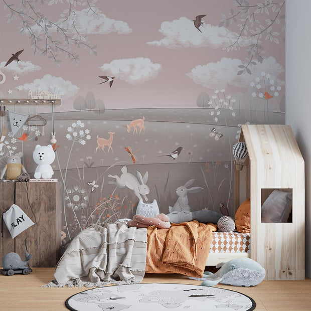 Enchanted woodland animal wall mural featuring rabbits, deer, birds, and wildflowers in a cozy children’s room with modern decor.