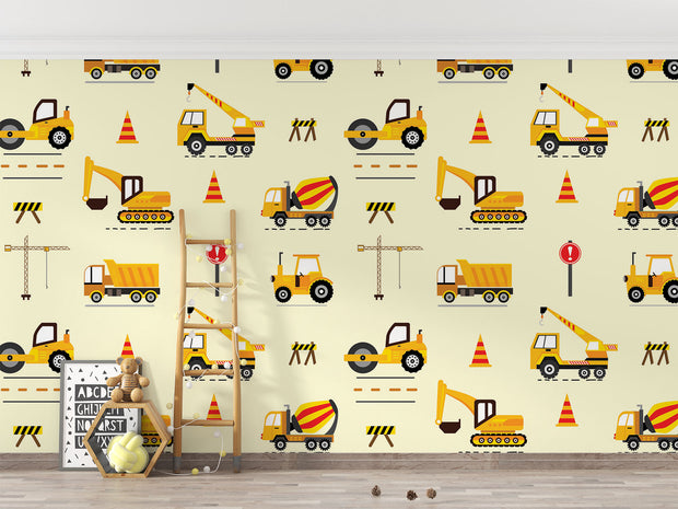 Excavators and dumpers wall mural featuring yellow trucks, cranes, diggers, and traffic cones on a light background, perfect for a boy's bedroom.