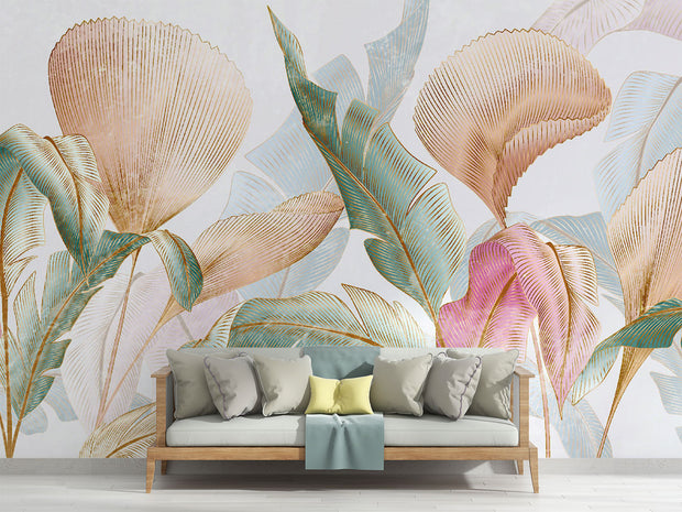 Pastel tropical leaf wall mural with oversized botanical patterns in soft pink, teal, and gold tones, perfect for modern, boho, and tropical-inspired interiors.