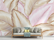 Blush and gold tropical leaf wall mural with oversized botanical patterns, featuring fine line details, perfect for modern, boho, and chic interior decor.