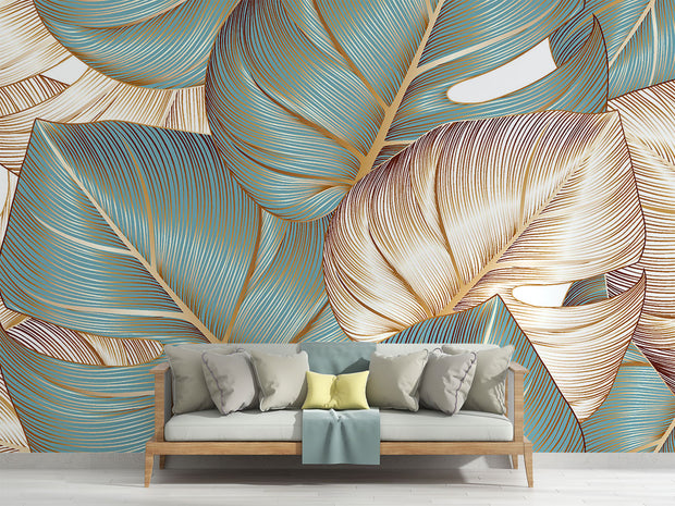 Teal and gold tropical leaf wall mural with oversized botanical patterns and fine-line detailing, perfect for modern, tropical, and boho-inspired interiors.