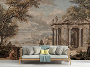 Classical Italian landscape wall mural featuring Renaissance architecture and figures in sepia tones, styled in modern minimalist room.