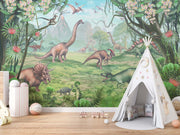 Jurassic Dinosaur Wall Mural – Realistic Prehistoric Scene with Brachiosaurus, Triceratops, and Velociraptors in a Lush Green Landscape for Kids' Rooms.