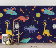 Space Dinosaurs Wall Mural featuring colorful astronaut dinosaurs, planets and stars; decorating kid's playroom.