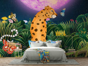 Midnight Safari wall mural with a whimsical leopard in a vibrant jungle, surrounded by butterflies and a glowing purple moon, styled in a modern bedroom.