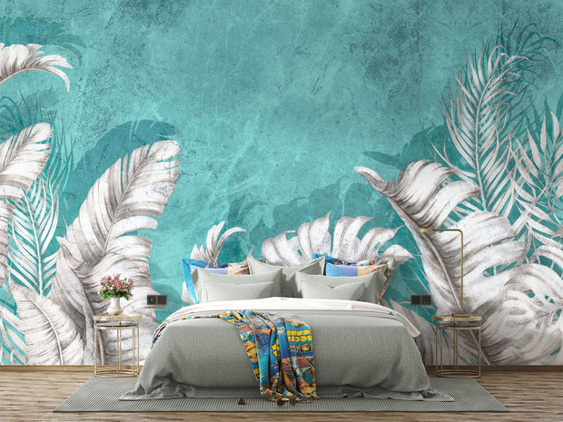 Large white palm leaves on a textured turquoise background in a tropical wall mural, perfect for modern and coastal interiors.