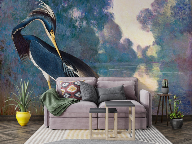 River Grace wall mural featuring a poised heron with rich blue feathers against a dreamy Impressionist river landscape in calming, painterly tones.