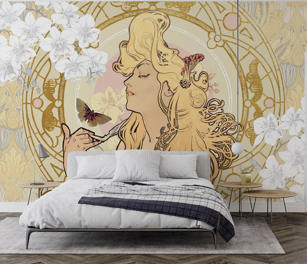 Art Nouveau wall mural with a golden-haired muse, white florals, intricate golden details, and a butterfly; decorating a bedroom.