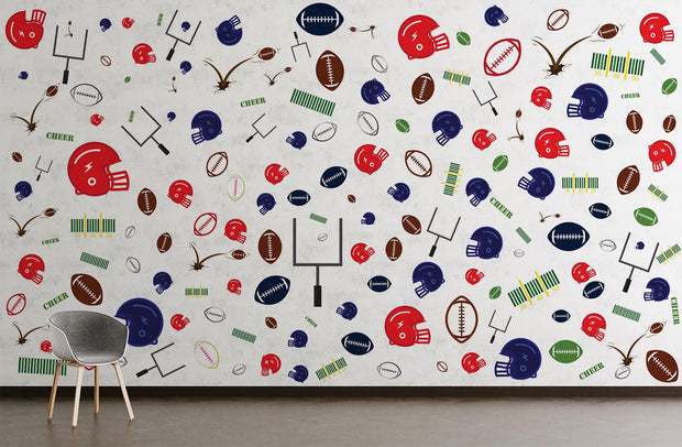 Vibrant football wall mural with colorful helmets, footballs and goalposts; decorating kid's room.