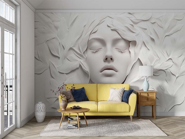 3D Sculptural Face Wall Mural – Elegant Abstract Art Wallpaper Featuring an Ethereal Face with Flowing Leaf Textures in Monochromatic Ivory Tones for Luxury Interiors.