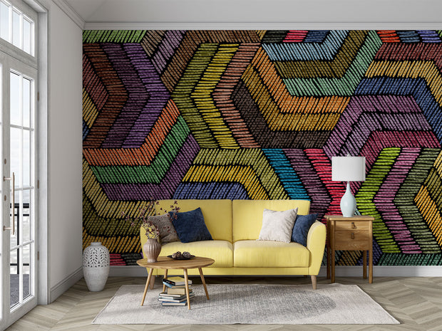 Modern rainbow geometric wall mural with textured chevron pattern, styled in minimalist living room with yellow sofa.