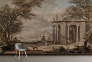 Classical Italian landscape wall mural featuring Renaissance architecture and figures in sepia tones, styled in modern minimalist room.