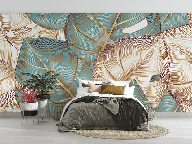 Teal and gold tropical leaf wall mural with oversized botanical patterns and fine-line detailing, perfect for modern, tropical, and boho-inspired interiors.