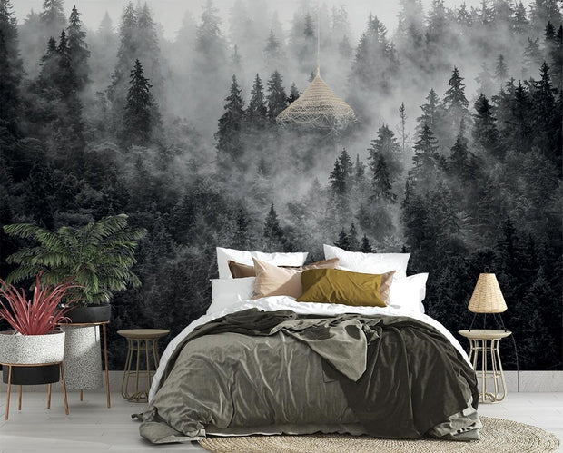 Foggy forest wall mural with pine trees enveloped in soft mist, creating a peaceful and elegant backdrop for any room.