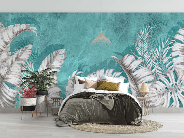 Large white palm leaves on a textured turquoise background in a tropical wall mural, perfect for modern and coastal interiors.