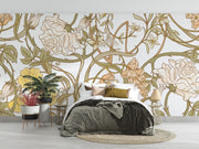 Art Nouveau botanical wall mural with flowing floral patterns in beige, sage green, and gold tones, styled in a modern bedroom.