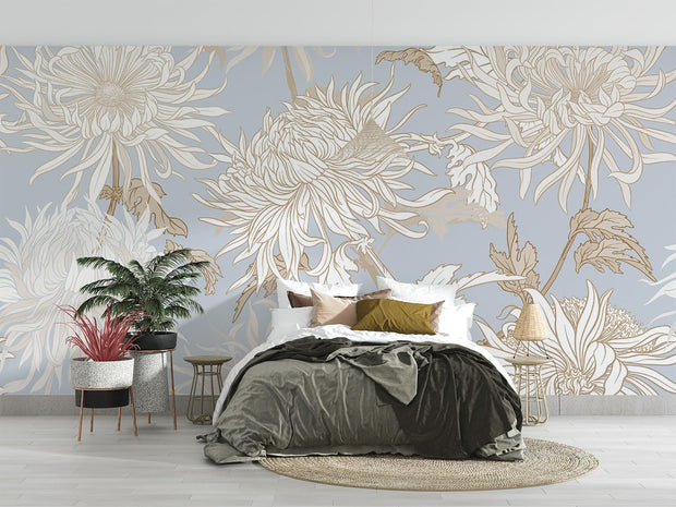 Elegant blue floral wall mural with intricate beige and gold chrysanthemums, styled in a modern bedroom.