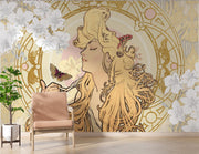 Art Nouveau wall mural with a golden-haired muse, white florals, intricate golden details, and a butterfly; decorating a living room.