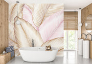 Blush and gold tropical leaf wall mural with oversized botanical patterns, featuring fine line details, perfect for modern, boho, and chic interior decor.