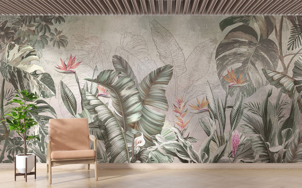 Elegant tropical wall mural with monstera leaves and birds of paradise flowers in sage green and coral, styled in modern living room.