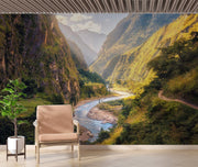 Majestic valley wall mural with green mountains, winding river, and sunlight, perfect for nature-inspired bedroom or living room décor.