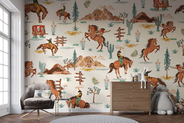 Wild West cowboy wall mural featuring galloping horses, cowboys, cacti, and Western landscapes in a vintage-style wallpaper design.