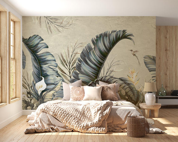 Tropical elegance wall mural featuring oversized banana leaves, bird of paradise flowers, and a hummingbird in muted tones for a bedroom.