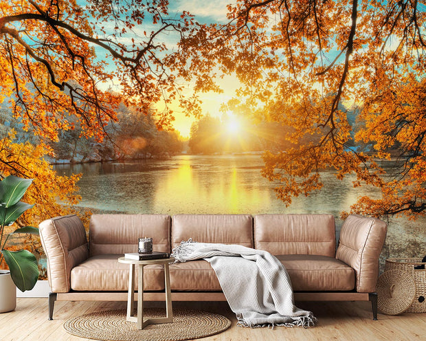 Golden lake wall mural with autumn trees, vibrant sunlight reflecting on the water, and a peaceful nature-inspired setting