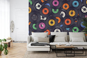 Vinyl records wall mural featuring a colorful retro collection of classic records stacked together, ideal for music-themed interiors.