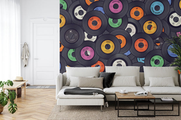 Vinyl records wall mural featuring a colorful retro collection of classic records stacked together, ideal for music-themed interiors.