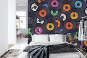 Vinyl records wall mural featuring a colorful retro collection of classic records stacked together, ideal for music-themed interiors.