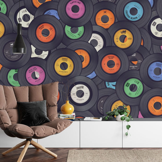 Vinyl records wall mural featuring a colorful retro collection of classic records stacked together, ideal for music-themed interiors.