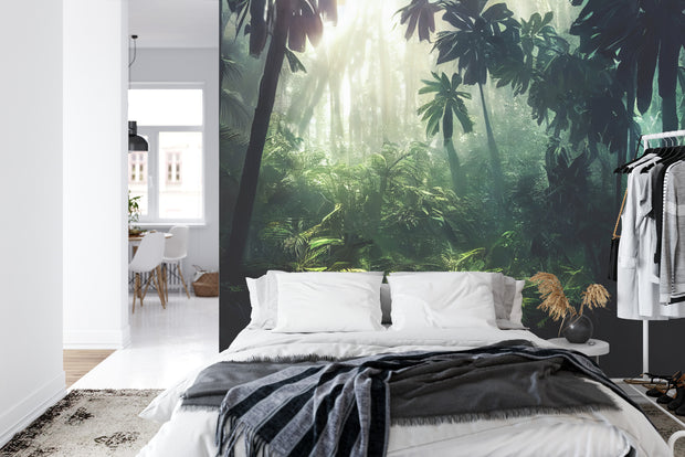 Rainforest jungle wall mural featuring dense greenery, tropical plants and sunlight streaming through the trees, creating a tranquil and vibrant ambiance.