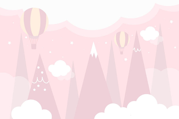 Pastel pink wall mural featuring hot air balloons, whimsical mountain peaks and soft clouds.