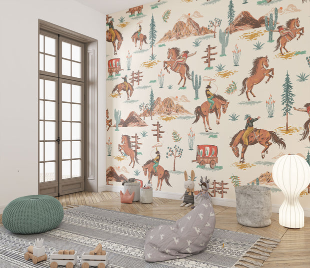 Wild West cowboy wall mural featuring galloping horses, cowboys, cacti, and Western landscapes in a vintage-style wallpaper design.