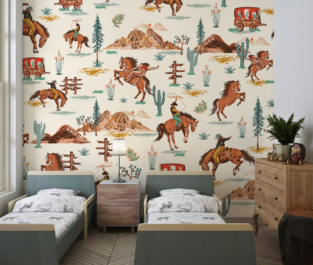 Wild West cowboy wall mural featuring galloping horses, cowboys, cacti, and Western landscapes in a vintage-style wallpaper design.