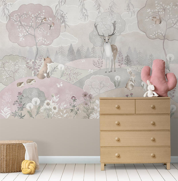 Whimsical woodland wall mural featuring a deer, fox, and rabbits in a pastel forest scene, styled in a modern kids’ room with cozy decor.