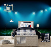 Night Lights Wall Mural featuring a green football field under bright stadium lights, ideal for sports-themed decor.