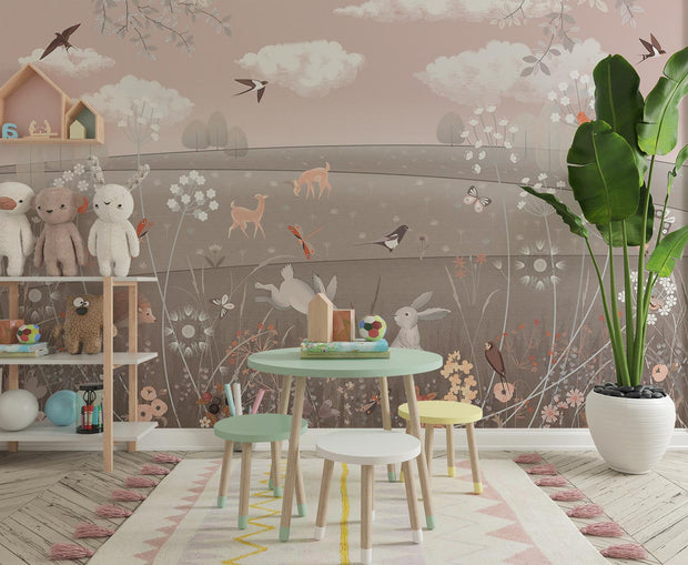 Enchanted woodland animal wall mural featuring rabbits, deer, birds, and wildflowers in a cozy children’s playroom.