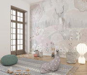 Whimsical woodland wall mural featuring a deer, fox, and rabbits in a pastel forest scene, styled in a modern kids’ room with cozy decor.