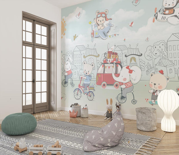 Animal-themed wall mural featuring animals riding bikes, scooters and driving cars in a whimsical pastel-colored town, decorating a kid's bedroom with cozy decor.